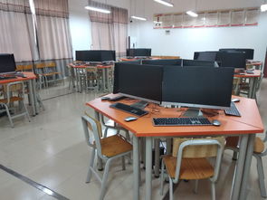 中职实训机房多媒体一体机及电脑办公设备投入使用与维修管理